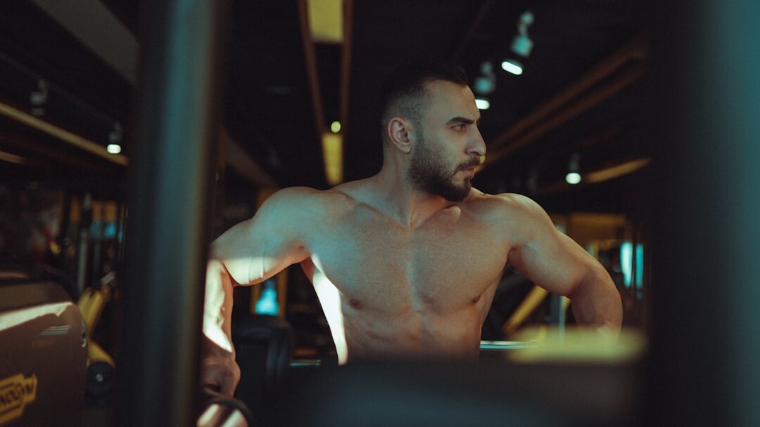 man exercising in gym